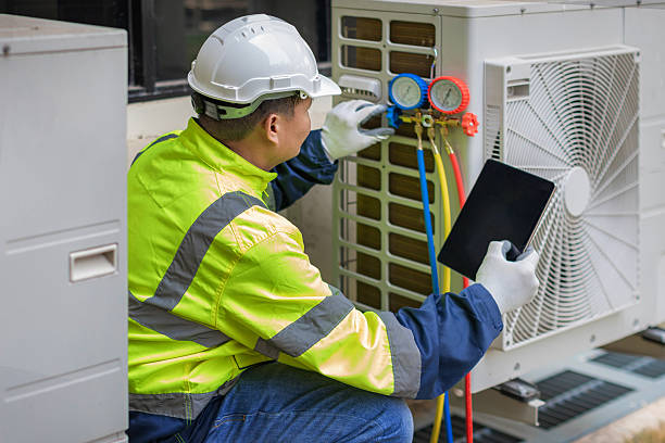 Professional Heat Pump Repair technician working in Hammond, IN